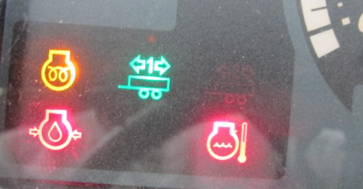 What do the different colors on John Deere warning lights mean