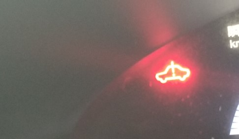 What does the Red Car With Key Symbol On Dashboard mean